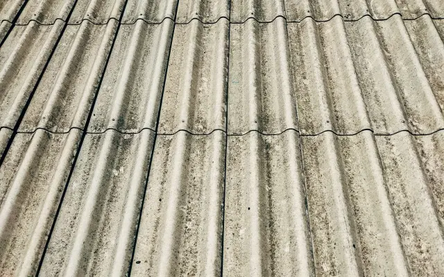 Close-up of a grey corrugated fibre-cement roof